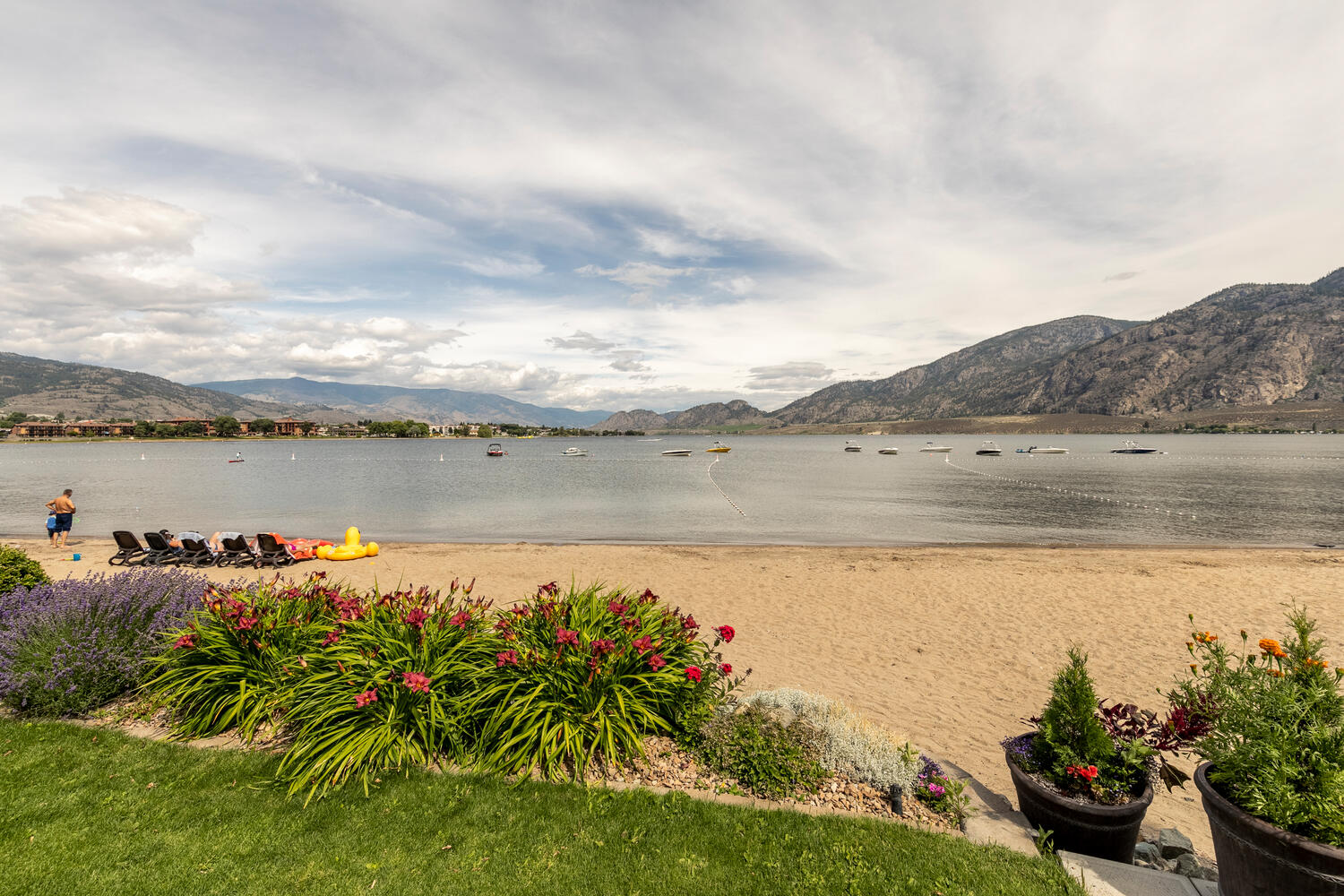 Sandy beach and lakefront view in Osoyoos
