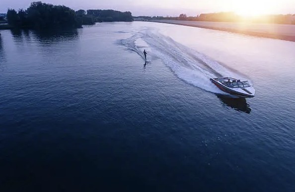 Water skiing on Osoyoos Lake at sunset