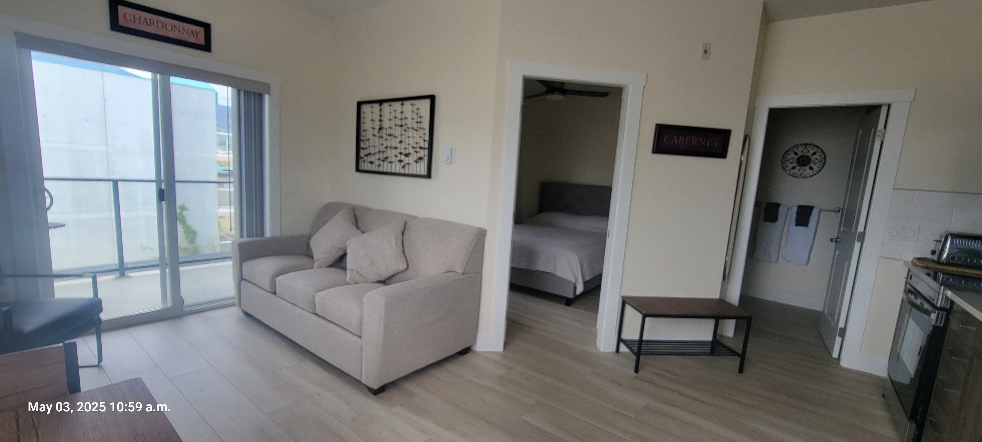 Lounge and bedroom entry in the Deluxe 1 Bedroom suite