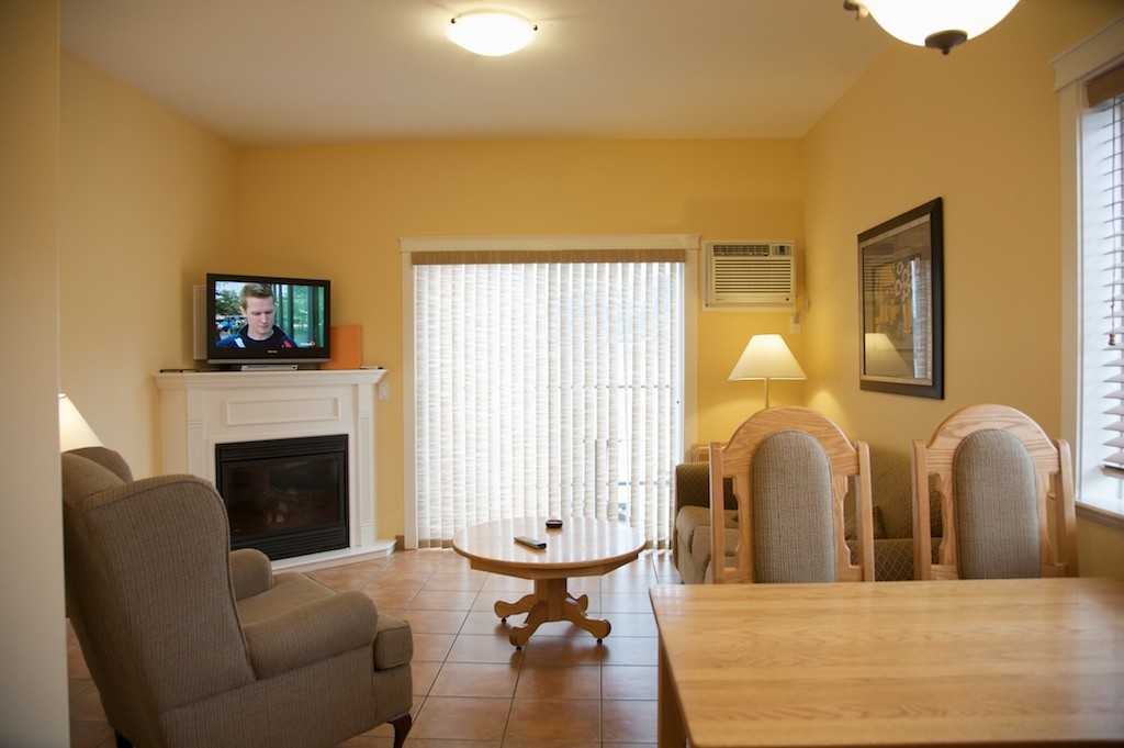 Living and dining area in the Deluxe Waterfront 2 Bedroom suite